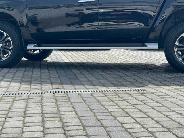 Черный Мицубиси Л 200, объемом двигателя 0 л и пробегом 58 тыс. км за 32900 $, фото 21 на Automoto.ua