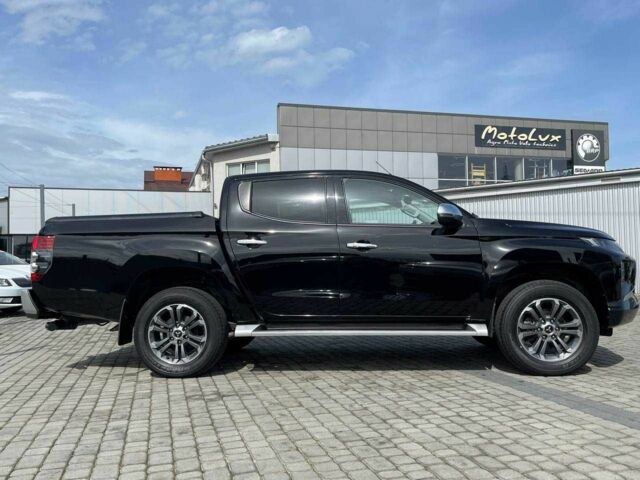 Черный Мицубиси Л 200, объемом двигателя 0 л и пробегом 58 тыс. км за 32900 $, фото 1 на Automoto.ua