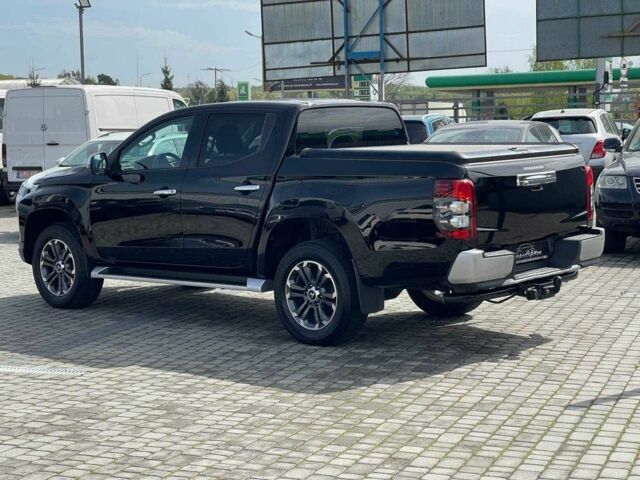 Черный Мицубиси Л 200, объемом двигателя 0 л и пробегом 58 тыс. км за 32900 $, фото 6 на Automoto.ua