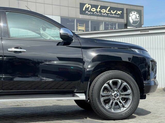 Черный Мицубиси Л 200, объемом двигателя 0 л и пробегом 58 тыс. км за 32900 $, фото 7 на Automoto.ua