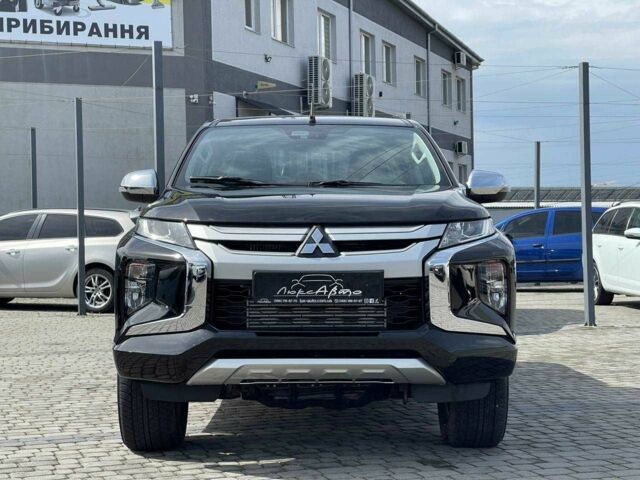 Черный Мицубиси Л 200, объемом двигателя 0 л и пробегом 58 тыс. км за 32900 $, фото 2 на Automoto.ua