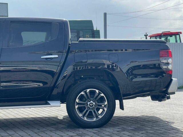 Черный Мицубиси Л 200, объемом двигателя 0 л и пробегом 58 тыс. км за 32900 $, фото 12 на Automoto.ua