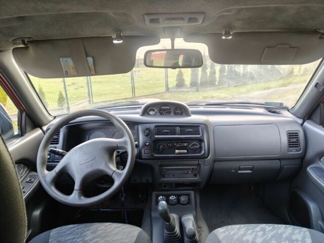 Коричневый Мицубиси Л 200, объемом двигателя 2.5 л и пробегом 194 тыс. км за 2350 $, фото 7 на Automoto.ua