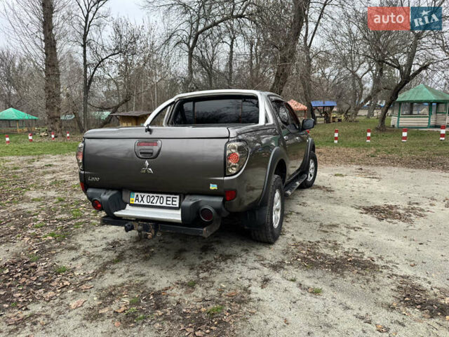 Коричневий Міцубісі Л 200, об'ємом двигуна 2.48 л та пробігом 317 тис. км за 15500 $, фото 2 на Automoto.ua