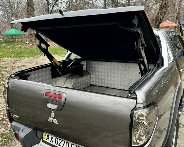 Коричневий Міцубісі Л 200, об'ємом двигуна 2.48 л та пробігом 317 тис. км за 15500 $, фото 4 на Automoto.ua