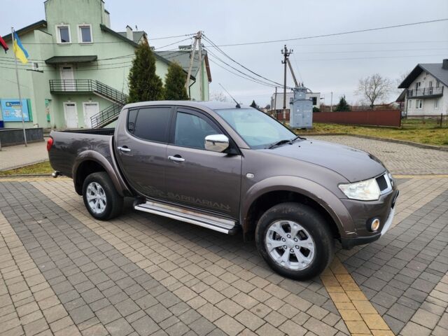 Коричневый Мицубиси Л 200, объемом двигателя 2.5 л и пробегом 159 тыс. км за 8398 $, фото 2 на Automoto.ua