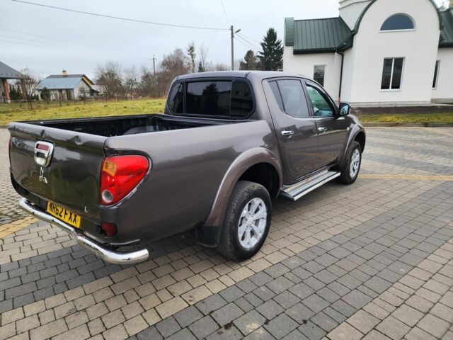 Коричневый Мицубиси Л 200, объемом двигателя 2.5 л и пробегом 159 тыс. км за 8398 $, фото 11 на Automoto.ua