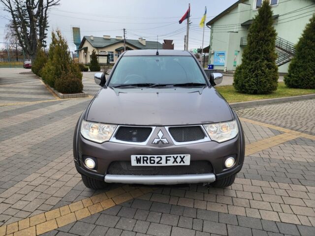 Коричневый Мицубиси Л 200, объемом двигателя 2.5 л и пробегом 159 тыс. км за 8398 $, фото 4 на Automoto.ua