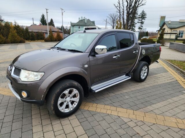 Коричневый Мицубиси Л 200, объемом двигателя 2.5 л и пробегом 159 тыс. км за 8398 $, фото 7 на Automoto.ua