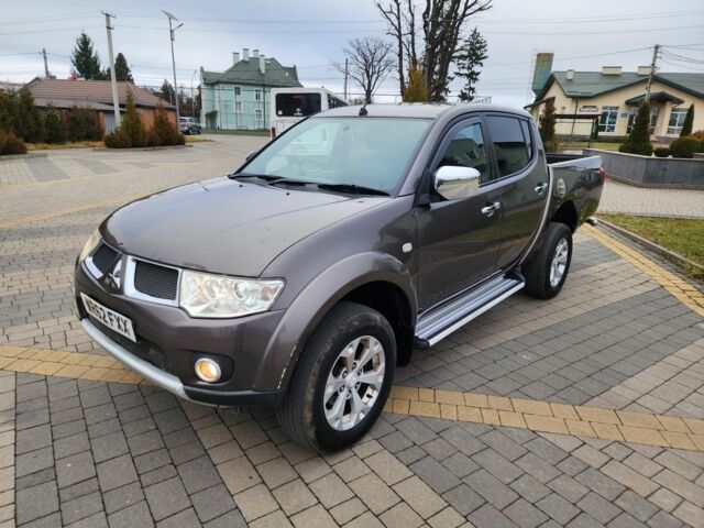 Коричневый Мицубиси Л 200, объемом двигателя 2.5 л и пробегом 159 тыс. км за 8398 $, фото 6 на Automoto.ua