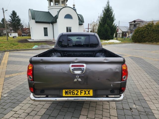 Коричневый Мицубиси Л 200, объемом двигателя 2.5 л и пробегом 159 тыс. км за 8398 $, фото 10 на Automoto.ua