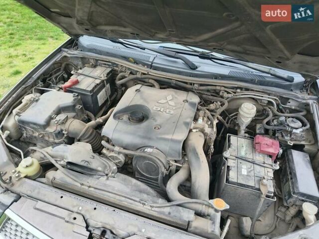 Коричневый Мицубиси Л 200, объемом двигателя 2.48 л и пробегом 251 тыс. км за 15500 $, фото 18 на Automoto.ua