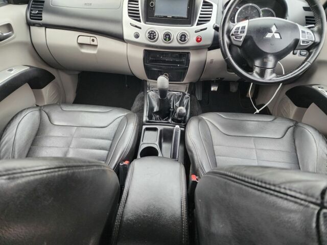 Коричневый Мицубиси Л 200, объемом двигателя 2.5 л и пробегом 159 тыс. км за 8398 $, фото 20 на Automoto.ua