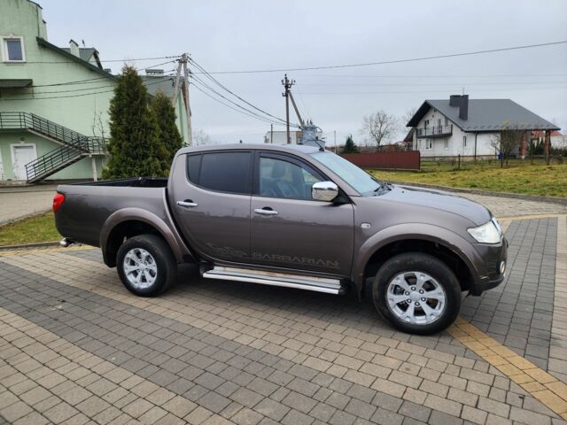 Коричневый Мицубиси Л 200, объемом двигателя 2.5 л и пробегом 159 тыс. км за 8398 $, фото 3 на Automoto.ua