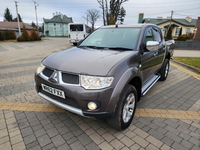 Коричневый Мицубиси Л 200, объемом двигателя 2.5 л и пробегом 159 тыс. км за 8398 $, фото 5 на Automoto.ua