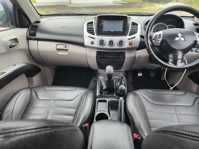 Коричневый Мицубиси Л 200, объемом двигателя 2.5 л и пробегом 159 тыс. км за 8398 $, фото 21 на Automoto.ua