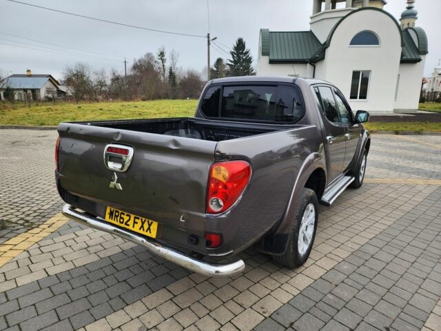 Коричневый Мицубиси Л 200, объемом двигателя 2.5 л и пробегом 159 тыс. км за 8398 $, фото 12 на Automoto.ua