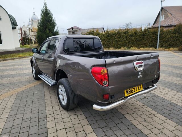 Коричневый Мицубиси Л 200, объемом двигателя 2.5 л и пробегом 159 тыс. км за 8398 $, фото 9 на Automoto.ua