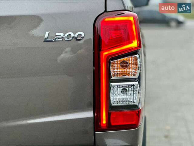 Коричневий Міцубісі Л 200, об'ємом двигуна 2.44 л та пробігом 107 тис. км за 29999 $, фото 28 на Automoto.ua