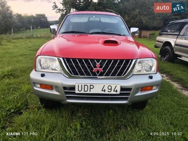 Красный Мицубиси Л 200, объемом двигателя 2.5 л и пробегом 272 тыс. км за 3200 $, фото 1 на Automoto.ua