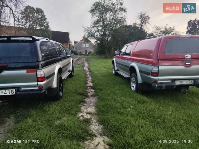 Красный Мицубиси Л 200, объемом двигателя 2.5 л и пробегом 272 тыс. км за 3200 $, фото 3 на Automoto.ua