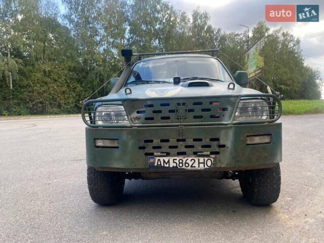 Красный Мицубиси Л 200, объемом двигателя 2.5 л и пробегом 200 тыс. км за 10140 $, фото 4 на Automoto.ua
