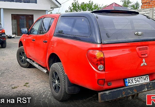 Червоний Міцубісі Л 200, об'ємом двигуна 2.5 л та пробігом 220 тис. км за 13900 $, фото 3 на Automoto.ua