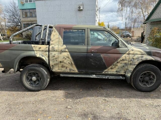 Міцубісі Л 200 2004 у Изюме на Automoto.ua Міцубісі Л 200, об'ємом двигуна 2.5 л та пробігом 280 тис. км за 3800 $, фото 2 на Automoto.ua