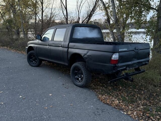 Мицубиси Л 200, объемом двигателя 2.5 л и пробегом 200 тыс. км за 5850 $, фото 1 на Automoto.ua