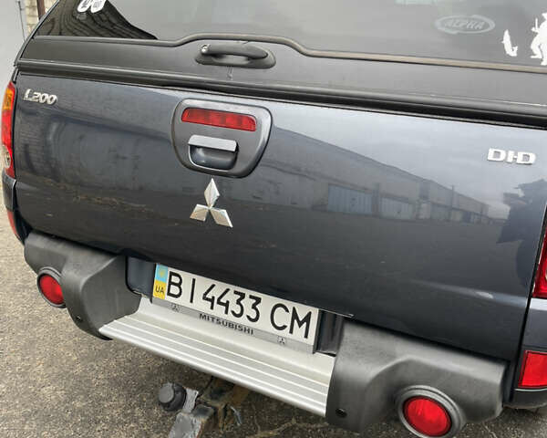 Мицубиси Л 200, объемом двигателя 2.5 л и пробегом 157 тыс. км за 15500 $, фото 3 на Automoto.ua