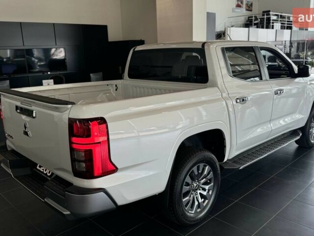 купить новое авто Мицубиси Л 200 2025 года от официального дилера Mitsubishi Арма Моторс Мицубиси фото
