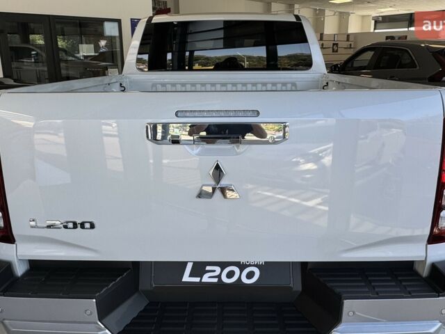 купить новое авто Мицубиси Л 200 2025 года от официального дилера Автоцентр AUTO.RIA Мицубиси фото