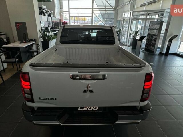 купить новое авто Мицубиси Л 200 2025 года от официального дилера Mitsubishi Арма Моторс Мицубиси фото