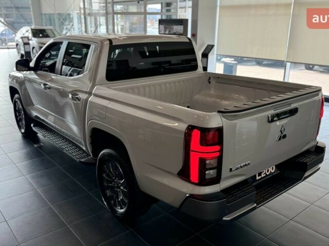 купить новое авто Мицубиси Л 200 2025 года от официального дилера Mitsubishi Арма Моторс Мицубиси фото