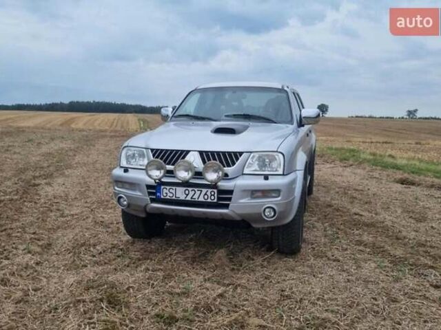 Сірий Міцубісі Л 200, об'ємом двигуна 2.5 л та пробігом 245 тис. км за 2400 $, фото 2 на Automoto.ua
