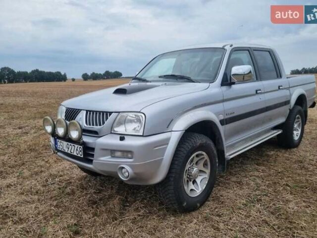 Сірий Міцубісі Л 200, об'ємом двигуна 2.5 л та пробігом 245 тис. км за 2400 $, фото 1 на Automoto.ua