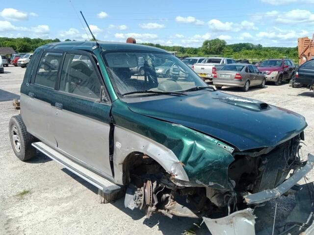 Серый Мицубиси Л 200, объемом двигателя 2.5 л и пробегом 400 тыс. км за 1000 $, фото 1 на Automoto.ua