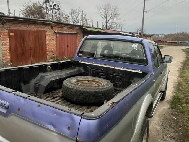 Сірий Міцубісі Л 200, об'ємом двигуна 2.5 л та пробігом 199 тис. км за 2500 $, фото 7 на Automoto.ua