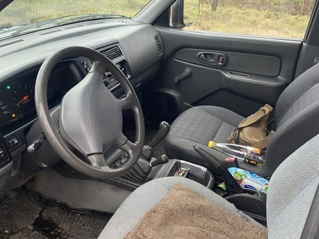 Сірий Міцубісі Л 200, об'ємом двигуна 2.5 л та пробігом 300 тис. км за 5500 $, фото 1 на Automoto.ua