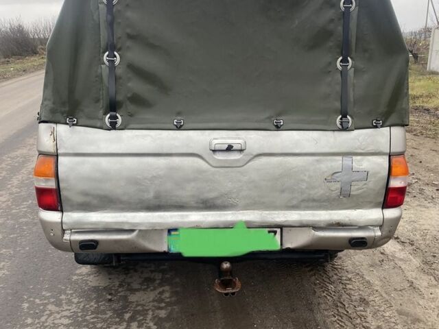 Сірий Міцубісі Л 200, об'ємом двигуна 2.5 л та пробігом 300 тис. км за 5500 $, фото 6 на Automoto.ua