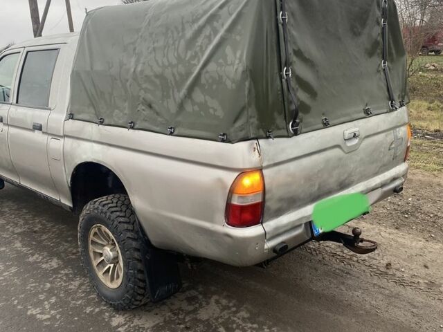 Сірий Міцубісі Л 200, об'ємом двигуна 2.5 л та пробігом 300 тис. км за 5500 $, фото 7 на Automoto.ua