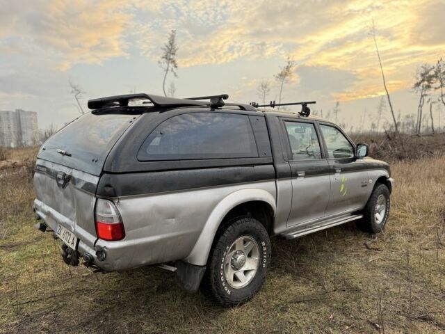 Серый Мицубиси Л 200, объемом двигателя 2.5 л и пробегом 258 тыс. км за 4500 $, фото 3 на Automoto.ua