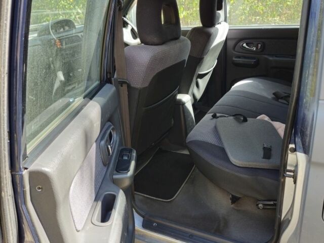 Серый Мицубиси Л 200, объемом двигателя 0 л и пробегом 277 тыс. км за 5339 $, фото 7 на Automoto.ua