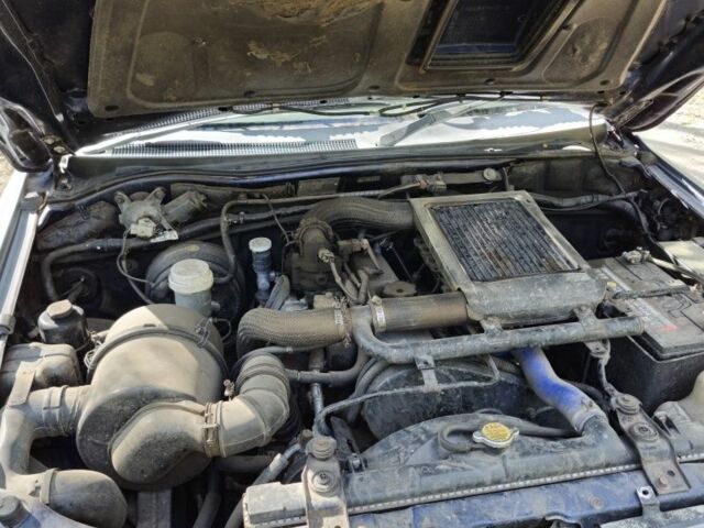 Серый Мицубиси Л 200, объемом двигателя 0 л и пробегом 277 тыс. км за 5339 $, фото 2 на Automoto.ua