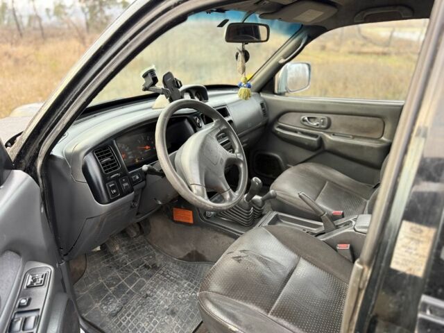 Серый Мицубиси Л 200, объемом двигателя 2.5 л и пробегом 258 тыс. км за 4500 $, фото 5 на Automoto.ua