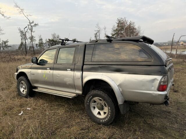 Серый Мицубиси Л 200, объемом двигателя 2.5 л и пробегом 258 тыс. км за 4500 $, фото 4 на Automoto.ua