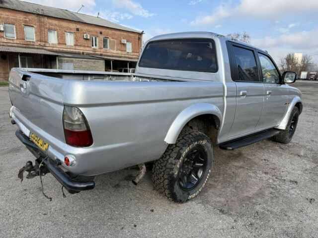 Сірий Міцубісі Л 200, об'ємом двигуна 2.5 л та пробігом 220 тис. км за 4300 $, фото 5 на Automoto.ua