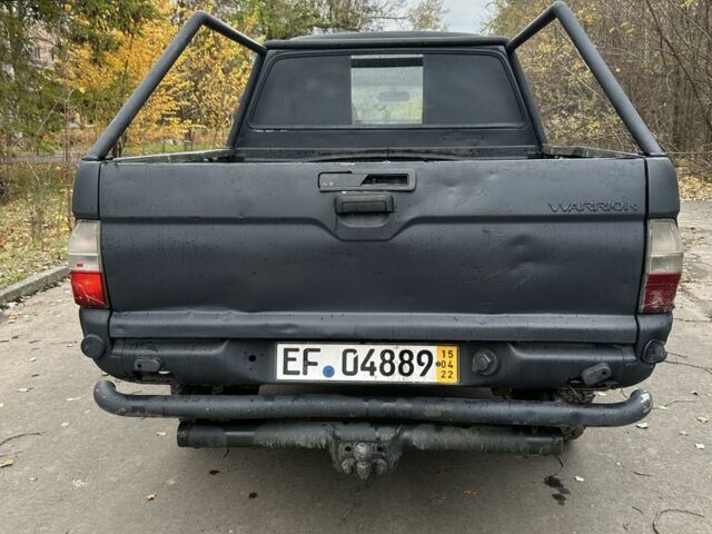 Сірий Міцубісі Л 200, об'ємом двигуна 2.5 л та пробігом 200 тис. км за 3650 $, фото 4 на Automoto.ua