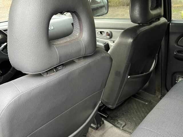 Серый Мицубиси Л 200, объемом двигателя 2.5 л и пробегом 100 тыс. км за 4700 $, фото 5 на Automoto.ua