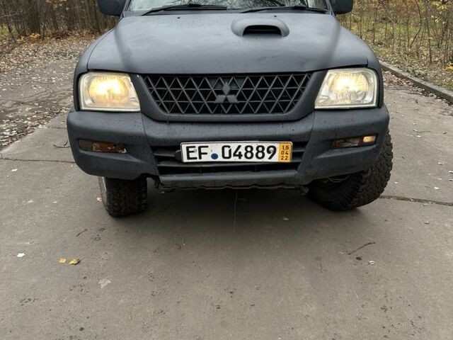 Сірий Міцубісі Л 200, об'ємом двигуна 2.5 л та пробігом 200 тис. км за 3650 $, фото 5 на Automoto.ua